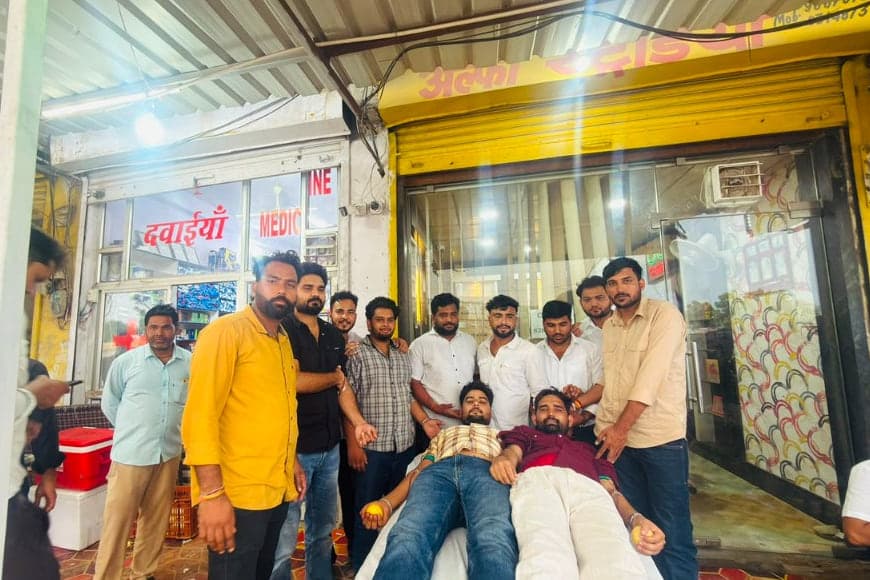 Wide view of the Allomart Pharmacy blood donation camp at Badpipli main bus stand, Rajawas, Sikar Road, Jaipur